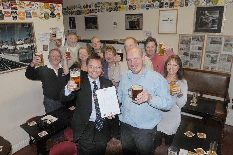 Hartlepool MP Iain Wright pictured with pub owner Peter Morgan after a presentation at the Rat Race pub, in Hartlepool railway station, which is one of the smallest pubs nationwide.