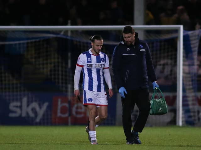 Hartlepool United's Jamie Sterry leaves the field injured during the League Two match with Mansfield Town. (Credit: Michael Driver | MI News)