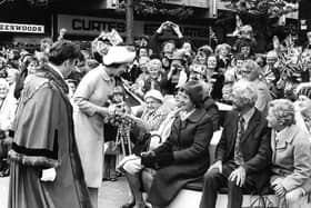 Queen Elizabeth II meets wellwishers in Middleton Grange Shopping Centre, Hartlepool, in July 1977 as part of her Silver Jubilee celebrations.