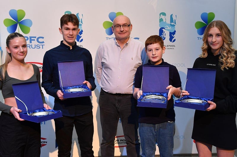 Secondary rising star awards are presented to Amy Hurst, Thomas Robson, Noah Parkes and Bella Hope by Guy Taylor. Picture by FRANK REID