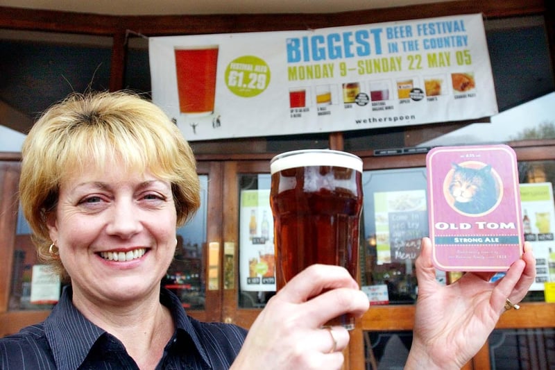 Alan was supported by his wife, Janet, who is pictured promoted a beer festival in 2005.