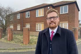 Councillor Jonathan Brash in front of the empty homes in Huckelhoven Way, Hartlepool. Picture by FRANK REID. 