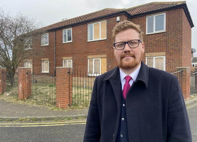 Councillor Jonathan Brash in front of the empty homes in Huckelhoven Way, Hartlepool. Picture by FRANK REID. 