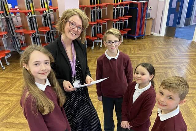 St Cuthbert's Catholic Primary School has been rated "good" by Ofsted inspectors following their latest inspection. Pictured is the headteacher, Mrs Joanne Wilson, with pupils Alice, Perrin, Lily and Joseph.