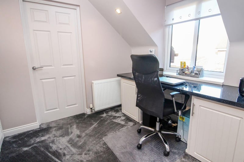 This cosy study area is ideal for a home office, and benefits from full length wall storage, a radiator, spotlights and access to the lounge and bedroom.