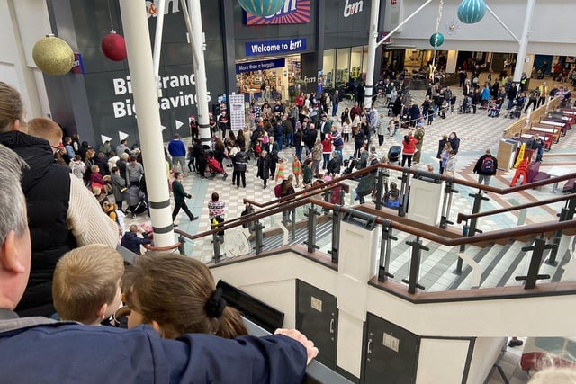 Crowds gathering as they await the arrival of Santa at Middleton Grange Shopping Centre. Picture by FRANK REID