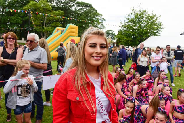 Last year's Feast Queen Chloe Hutchinson at the fete on the village green on Feast Saturday.