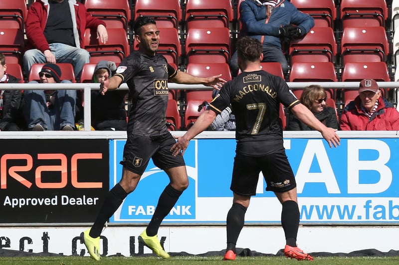 Benning celebrates after scoring his side's goal direct from a corner during the Sky Bet League Two match between Northampton Town and Mansfield Town at PTS Academy Stadium.