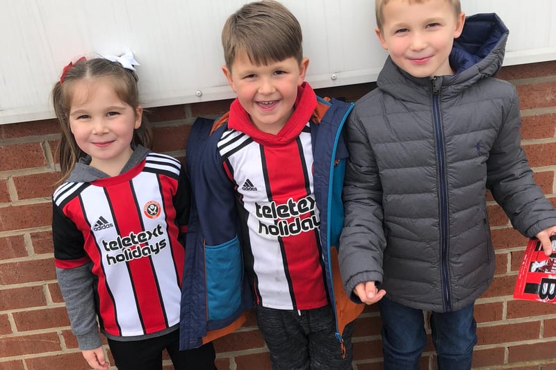 Billy Almond submitted this photo and wrote: "This is Daisy, Tom and George at a game during the promotion season from the Championship."