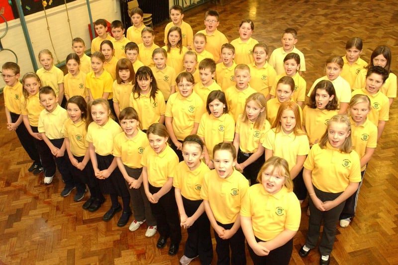 These pupils were getting festive with Christmas carols 17 years ago. Is there someone you know in the photo?