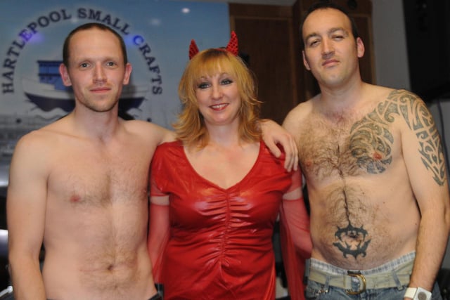 RNLI crewmembers Gavin Heaton and Ken Hay are pictured with beautician Karen Crangle before their sponsored chest wax in 2012.