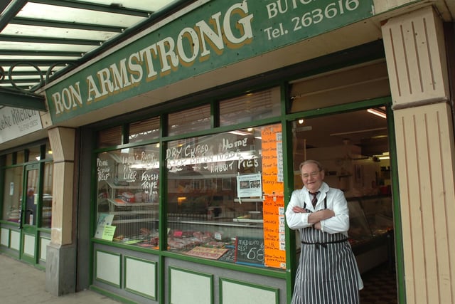 Ron Armstrong stands outside his butcher's shop in 2010.