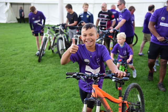 A thumbs-up from Lewin after completing his mega cycling challenge for Alice House Hospice in  2018.