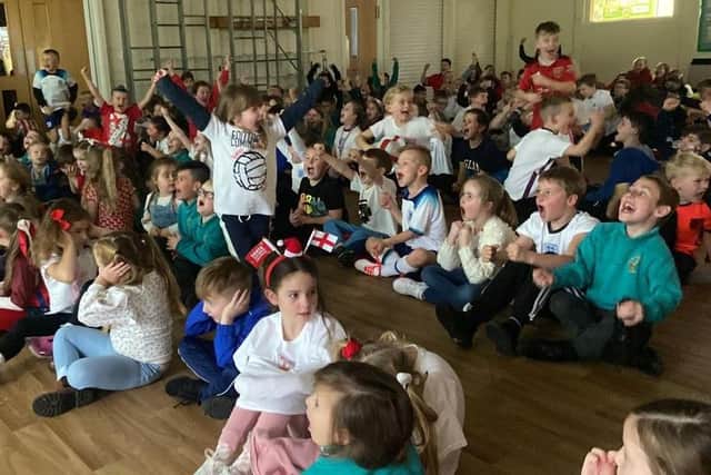 Children at Clavering Primary School went wild when another England goal went in.