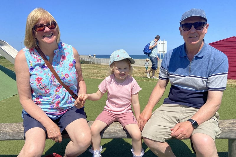 Gill and Chris Kerr with granddaughter Georgia enjoying the sun at Seaton Carew. Picture and caption by Frank Reid