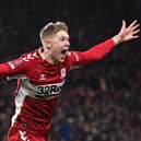 MIDDLESBROUGH, ENGLAND - MARCH 01: Josh Coburn of Middlesbrough celebrates after scoring the first goal during the Emirates FA Cup Fifth Round match between Middlesbrough and Tottenham Hotspur at Riverside Stadium on March 01, 2022 in Middlesbrough, England. (Photo by Stu Forster/Getty Images)