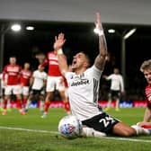 LONDON, ENGLAND - JANUARY 17: Anthony Knockaert of Fulham is fouled by Hayden Coulson of Middlesbrough FC during the Sky Bet Championship match between Fulham and Middlesbrough at Craven Cottage on January 17, 2020 in London, England. (Photo by James Chance/Getty Images)