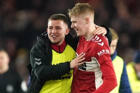 Middlesbrough's Sam Morsy (left) and Josh Coburn celebrate after the final whistle in the Emirates FA Cup fifth round match at the Riverside Stadium.