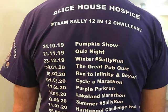 Phil Holbrook wears a t-shirt detailing the various challenges he has completed in the run up to his 60th birthday for Alice House Hospice.