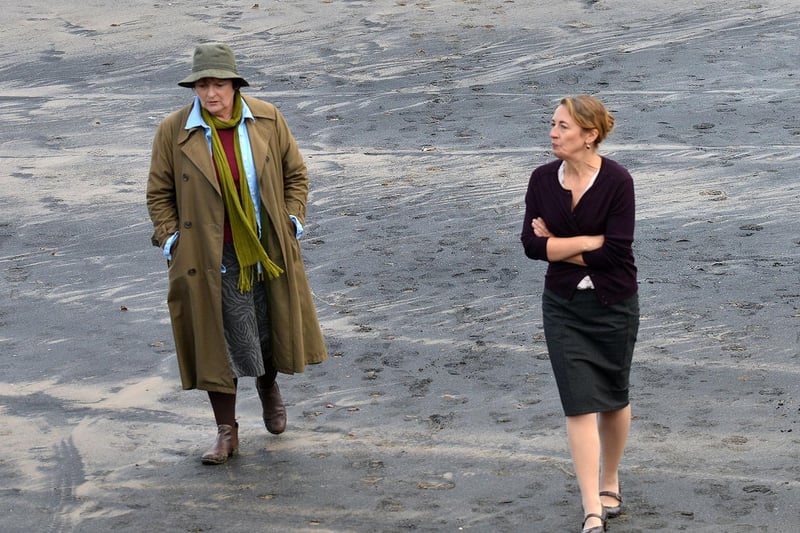 Brenda Blethyn and a fellow actress film a scene on Middleton Beach in 2015.