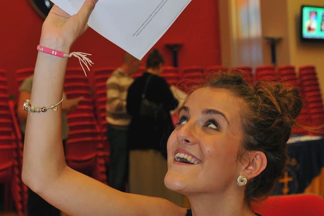 Phoebe Hartshorne celebrates her GCSE results at St. Hild's School in 2011.