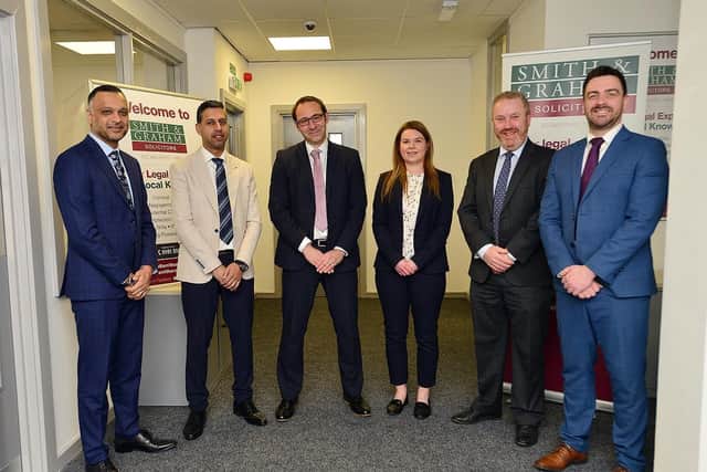 Left to right: Himat Sidhu, Jameel Bashir, Martin Scarborough, Helen Edmundson, Andrew Blair and Mark Davies of Smith and Graham Solicitors in their new office at Tranquility House. Picture by FRANK REID