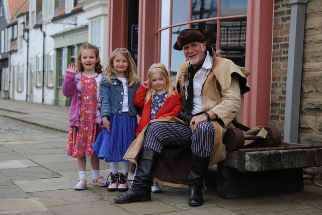 Pirate Steve Waites with visitors Amber Williamson, Hollie Dougherty, and Hannah Williamson.