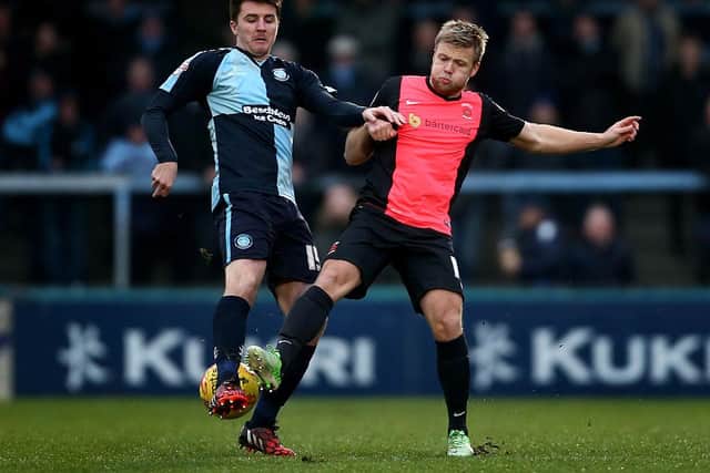 Peter Murphy of Wycombe tackles with Nicky Featherstone of Hartlepool during the Sky Bet League Two match between Wycombe Wanderers and Hartlepool United at Adams Park on January 3, 2015 in High Wycombe, England.  (Photo by Jordan Mansfield/Getty Images)