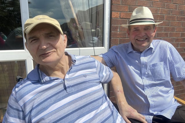 Brothers David, left, and Terry Phillips taking in the sun during celebrations at Warrior Park Care Home.