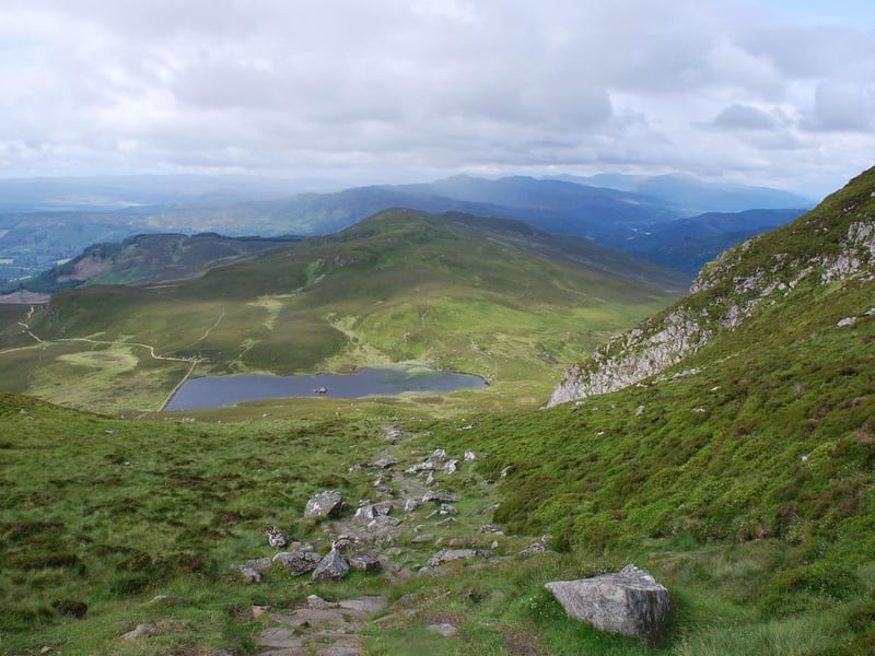 A popular peak for those visiting nearby Pitlochry, an ascent of Ben Vrackie follows good paths through woodland, moorland and pretty Loch a' Choire.