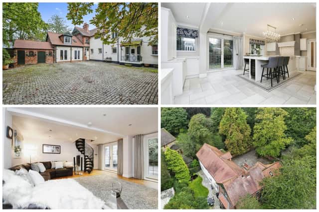This detached home has six bedrooms and four bathrooms.
