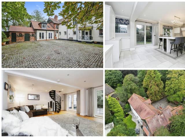 This detached home has six bedrooms and four bathrooms.