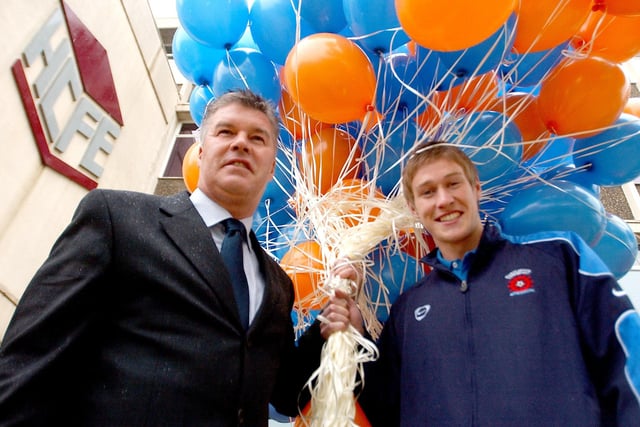 Chris Turner and Antony Sweeney take part in the college's balloon launch in 2006.