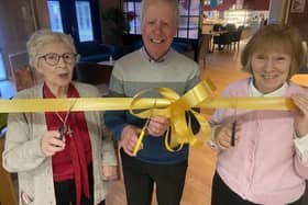 Hartfields residents (left to right) Mary Fletcher, George Wood and Marilyn Caygyll cut the ribbon to officially open the new coffee shop. Picture by FRANK REID