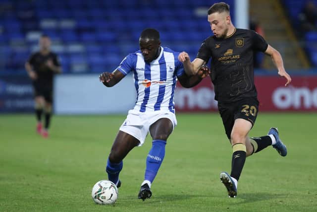 Olufela Olomola of Hartlepool United and Josh Lundstram of Crewe Alexandra in action during the Carabao Cup match between Hartlepool United and Crewe Alexandra at Victoria Park, Hartlepool on Tuesday 10th August 2021. (Credit: Will Matthews | MI News)