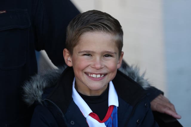 Young Hartlepool United supporter is all smiles ahead of the League Two fixture with Harrogate Town. (Credit: Mark Fletcher | MI News)