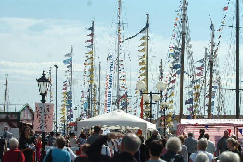 Crowds get ready to see the Tall Ships in all their glory.