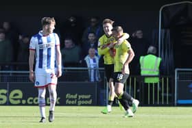 Harrogate Town's Jack Muldoon celebrates with Daniel Grant after scoring their second goal at the Envirovent Stadium against Hartlepool United. (Credit: Mark Fletcher | MI News)