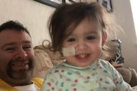 Gavin at home with daughter Poppy aged two who has chronic kidney failure.
