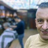 Barber Hassan Hawleri, at his barber shop King Kutz, in York Road.
