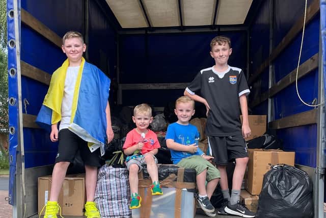 Little helpers  (from left to right): Joel Hogg, 11,  Charlie Hogg 3, Louie Chapman, 4, and Lennon Chapman, 10.