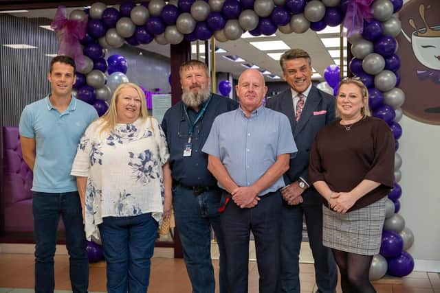 Middleton Grange Shopping Centre managers, with The Dancing Cup team and Hartlepool Development Corporation representatives at the cafe's opening. Photo: Tom Banks