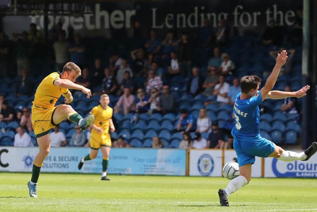 Rhys Oates of Hartlepool United shoots and scores their first goal. (Credit: Mark Fletcher | MI News)