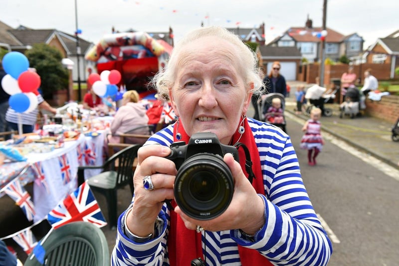 Photographer Jean Douglas snaps Mail photographer Frank Reid during the celebrations of the coronation at Hutton Avenue, Hartlepool.