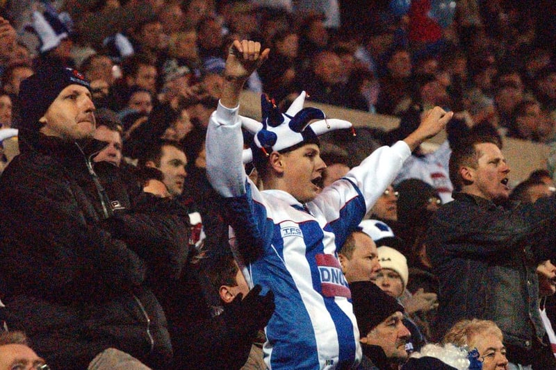 A Poolie sports the club's colours at the Stadium of Light.