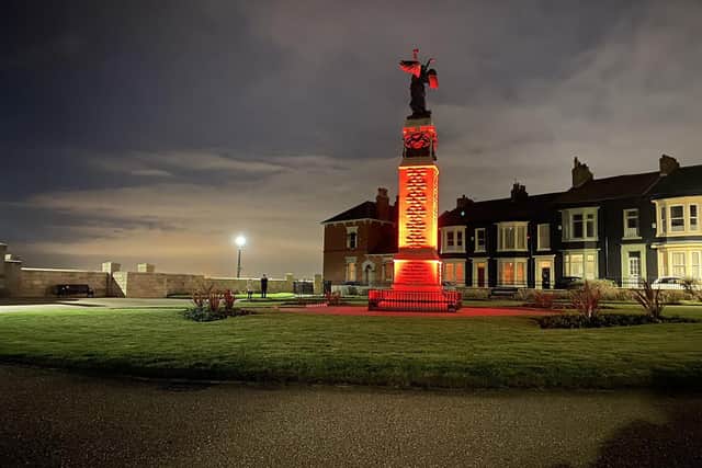 The War Memorial, in Croft Gardens, on the Headland, was also lit in red to mark Armistice Day.