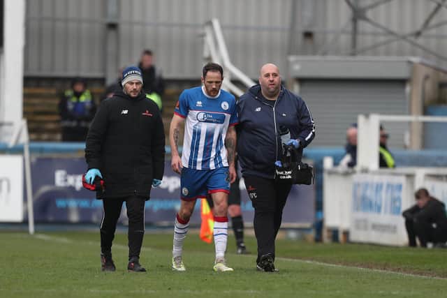 Rochdale frontman Kairo Mitchell was sent off for a challenge on Tom Parkes in the first half.