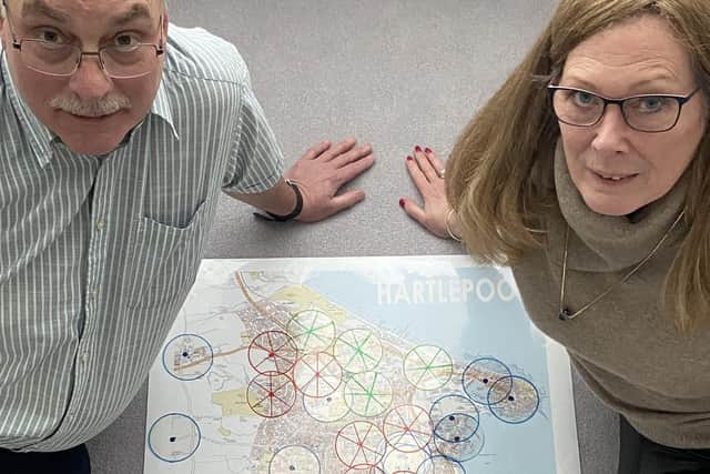 Bill and Pam Shurmer with a map of Hartlepool showing where defibrillators were installed (blue) and those that have recently been installed (red) along with proposals for new ones (green).