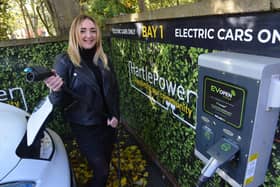 Hartlepower CIC staff team Lesley-Anne Smith offering people free use of electric car charging stations during COP26 at The Energy Hub.