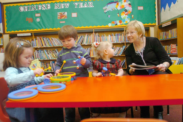 Banging the drum for memories from 2009. Here are library assistant Sheila Harrison with children during a Read and Rhyme session at Foggy Furze Library.